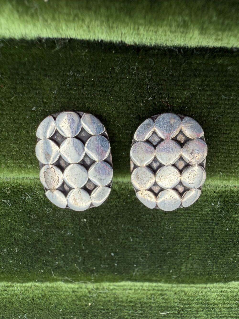Pebble sterling silver earrings featuring an oval mosaic studs